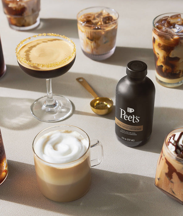 Peet's coffee bottle with various coffee drinks on a table