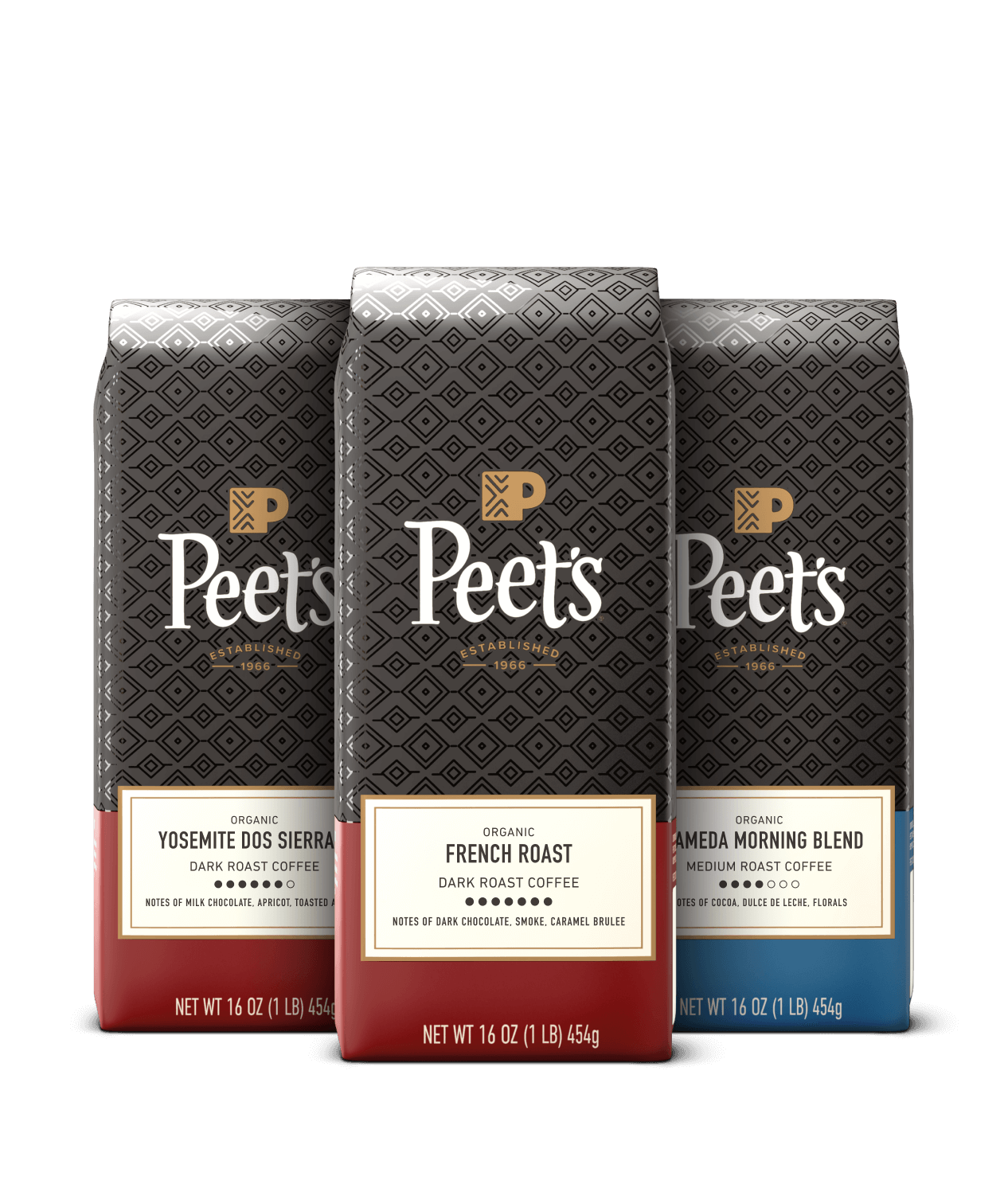 Three Peet's organic coffee bags with different blends on a black background