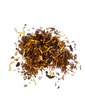 A pile of dry, caffeine-free organic rooibos tea leaves mixed with pieces of tropical fruit and blossoms.